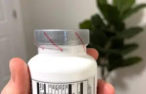 supplement bottle with sealed cap - shrink band